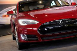 Tesla sees first profit this quarter