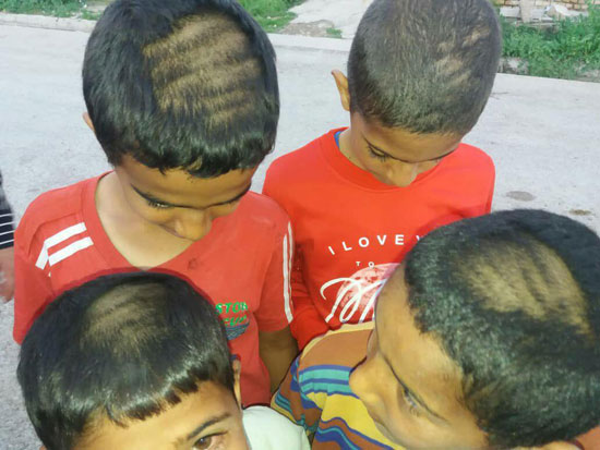 تراشیدن موی دانش آموزان هنوز از مُد نیفتاده!