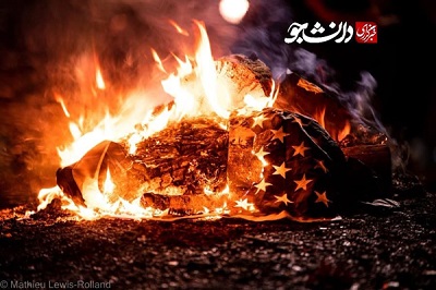 تصویری از پرچم سوخته آمریکا در اعتراضات پورتلند